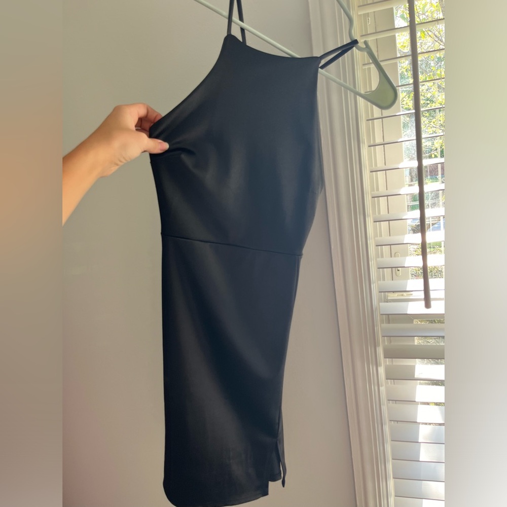 Black silk dress, size small. Worn once for dance, in great condition